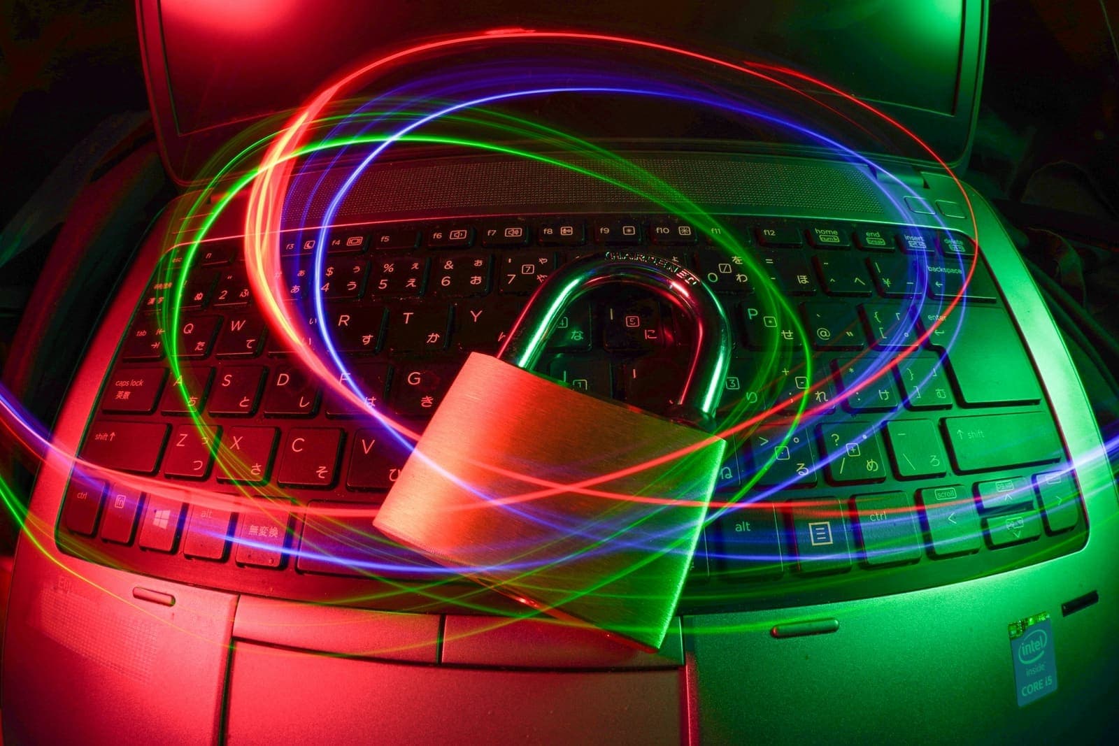 Abstract light trails circling a padlock, representing security awareness